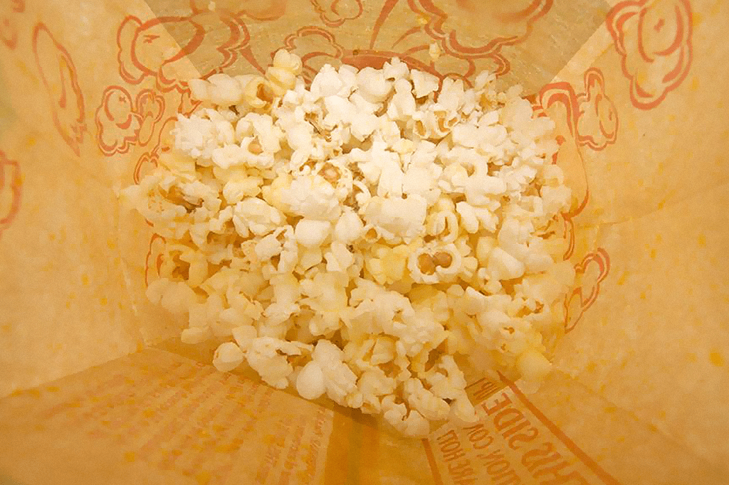 Posso colocar o lado de cima da pipoca de micro-ondas para baixo?