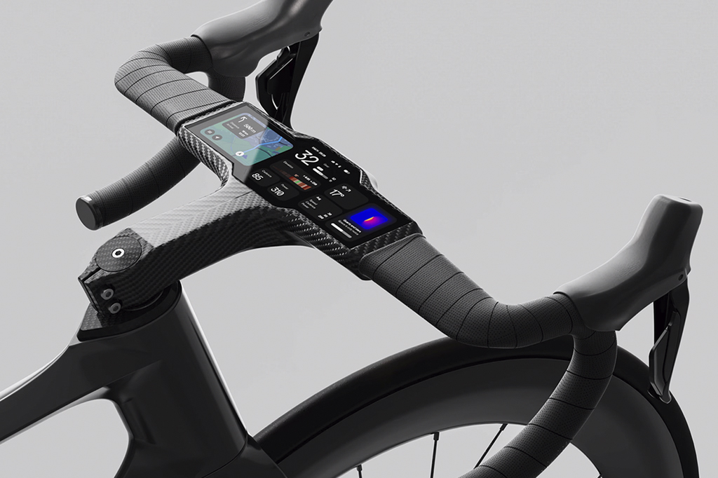 Imagem, em fundo cinza, de um guid&atilde;o de bicicleta com painel digital.