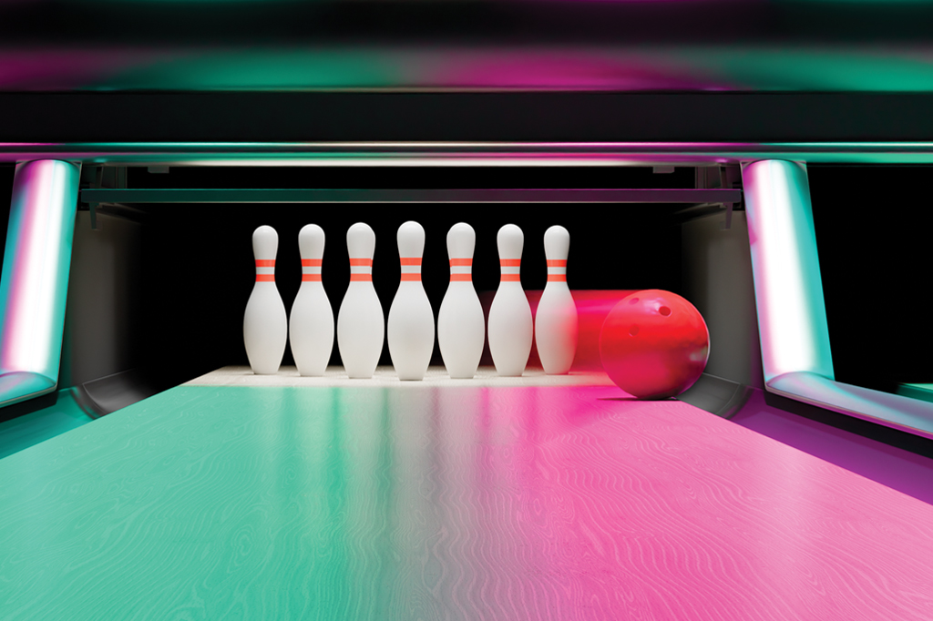 Imagem de uma pista de boliche. V&ecirc;-se sete pinos prestes a serem derrubados por uma bola.