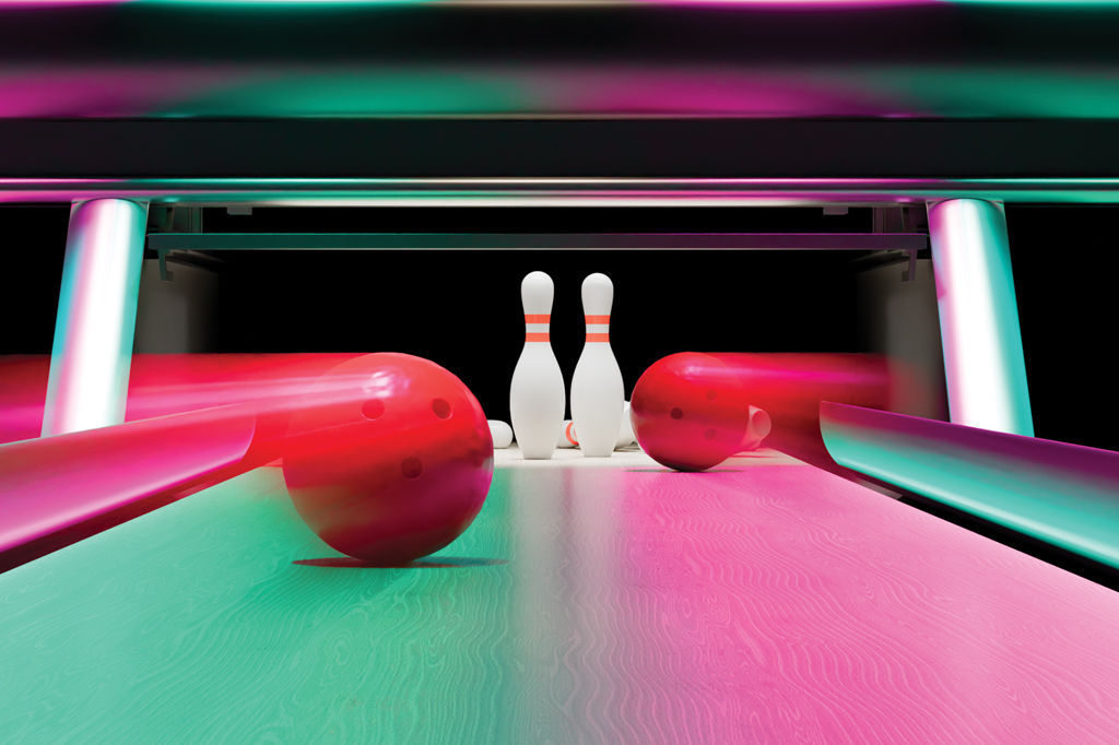 Imagem de uma pista de boliche. V&ecirc;-se dois pinos prestes a serem derrubados por duas bolas.